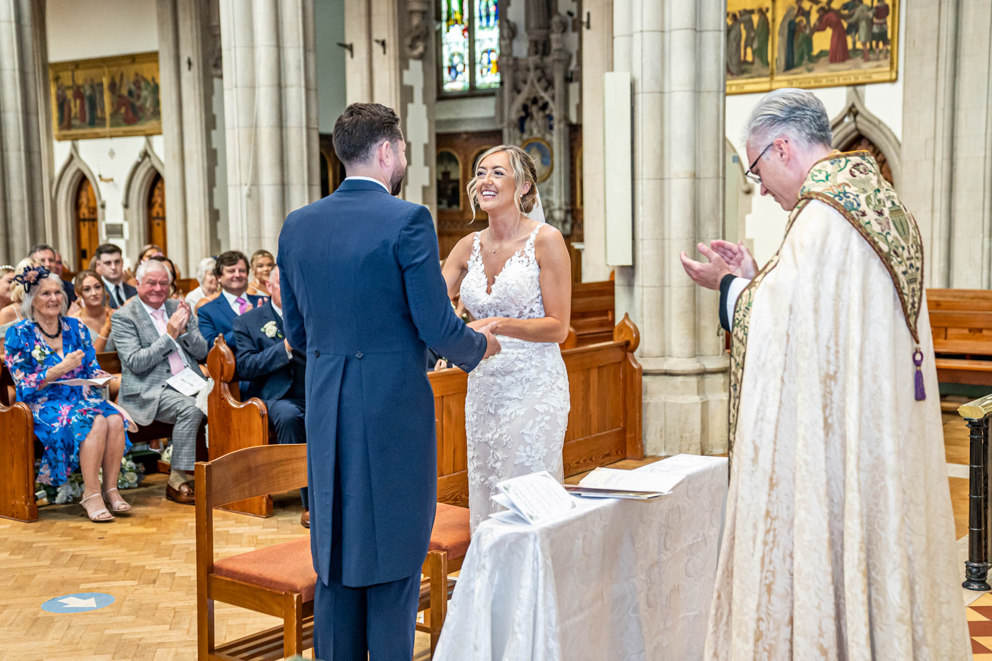 Bride and groom kiss.