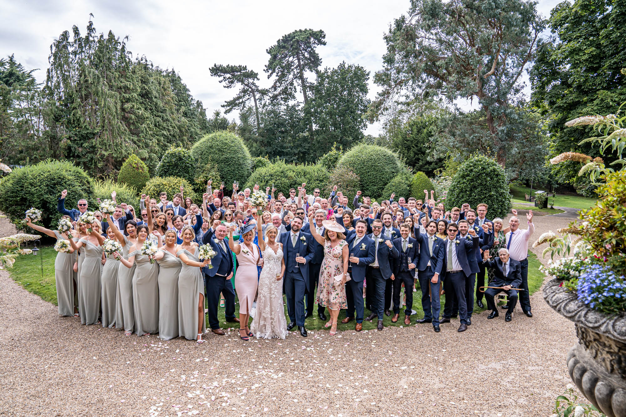 Newlyweds with their wedding guests.