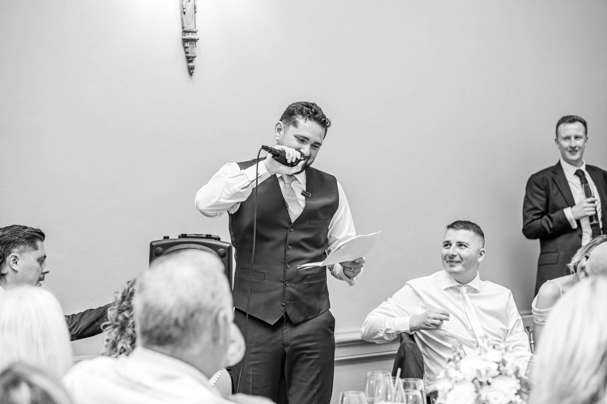 Groom gives wedding speech.