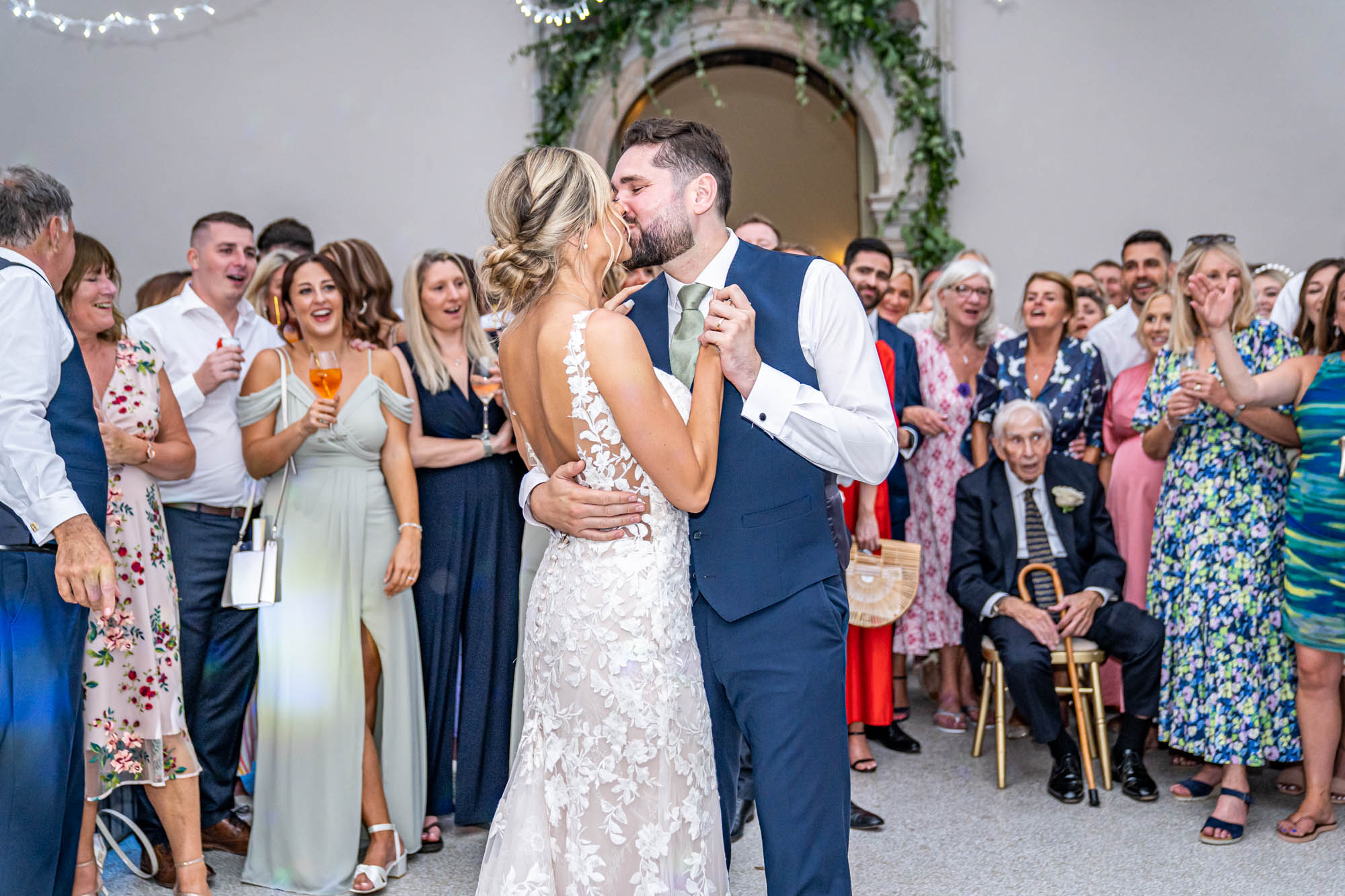 Groom and bride have their first dance together.