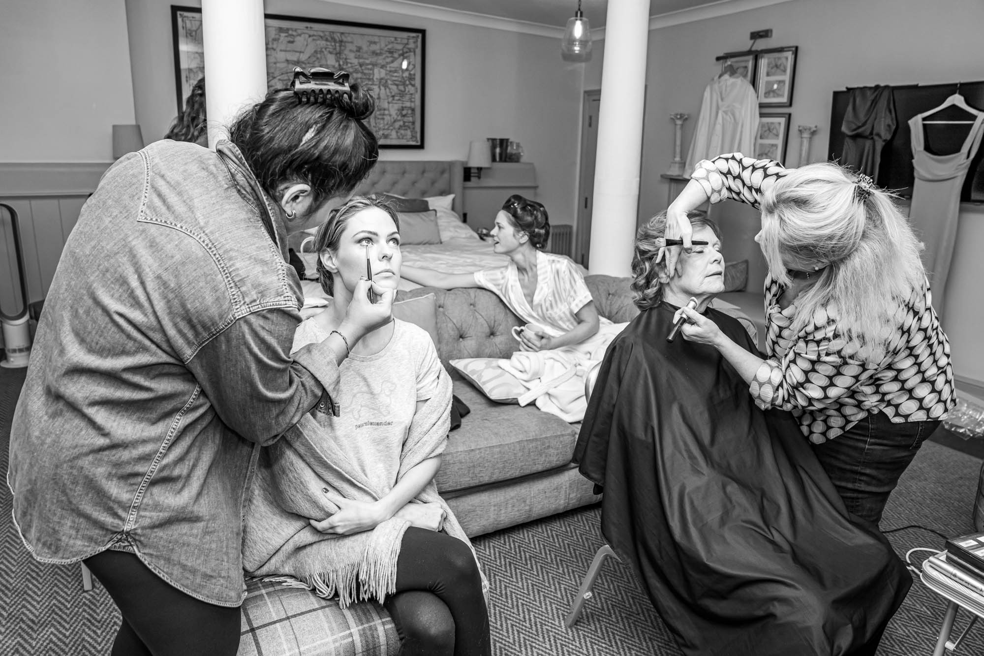 Bridesmaids getting ready together 