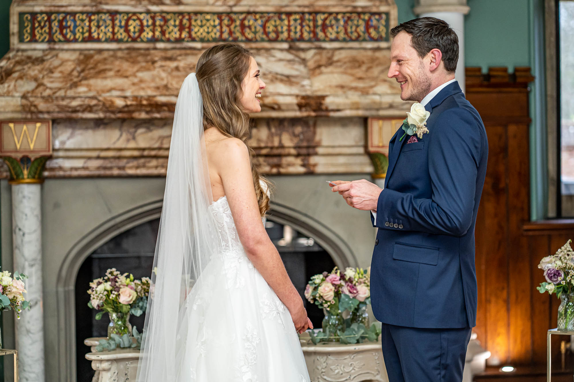 Groom reads his wedding vows to the bride.