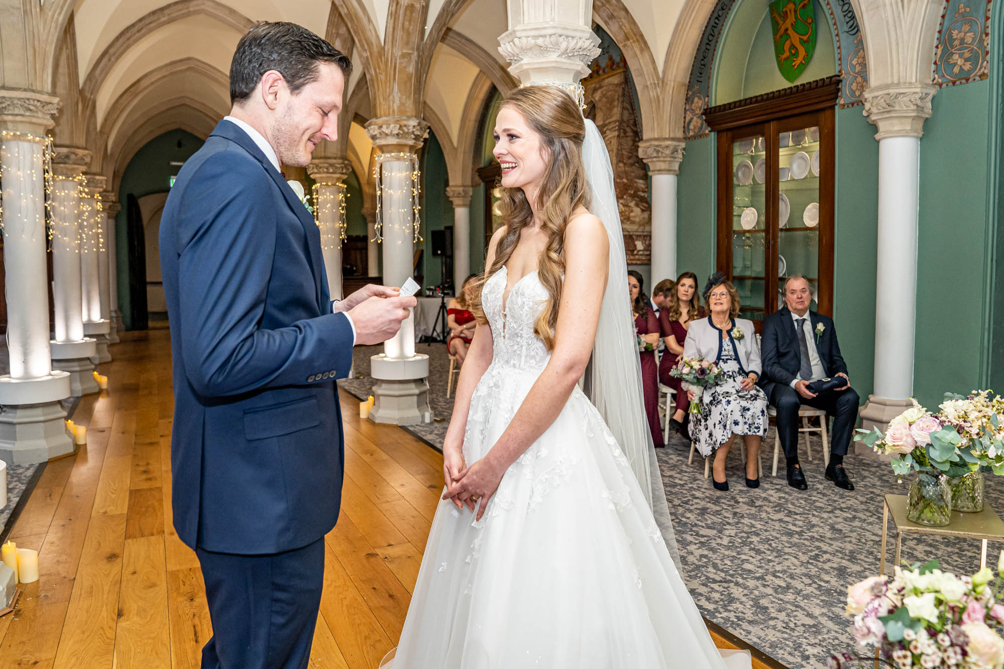 Wedding vows are exchanged.