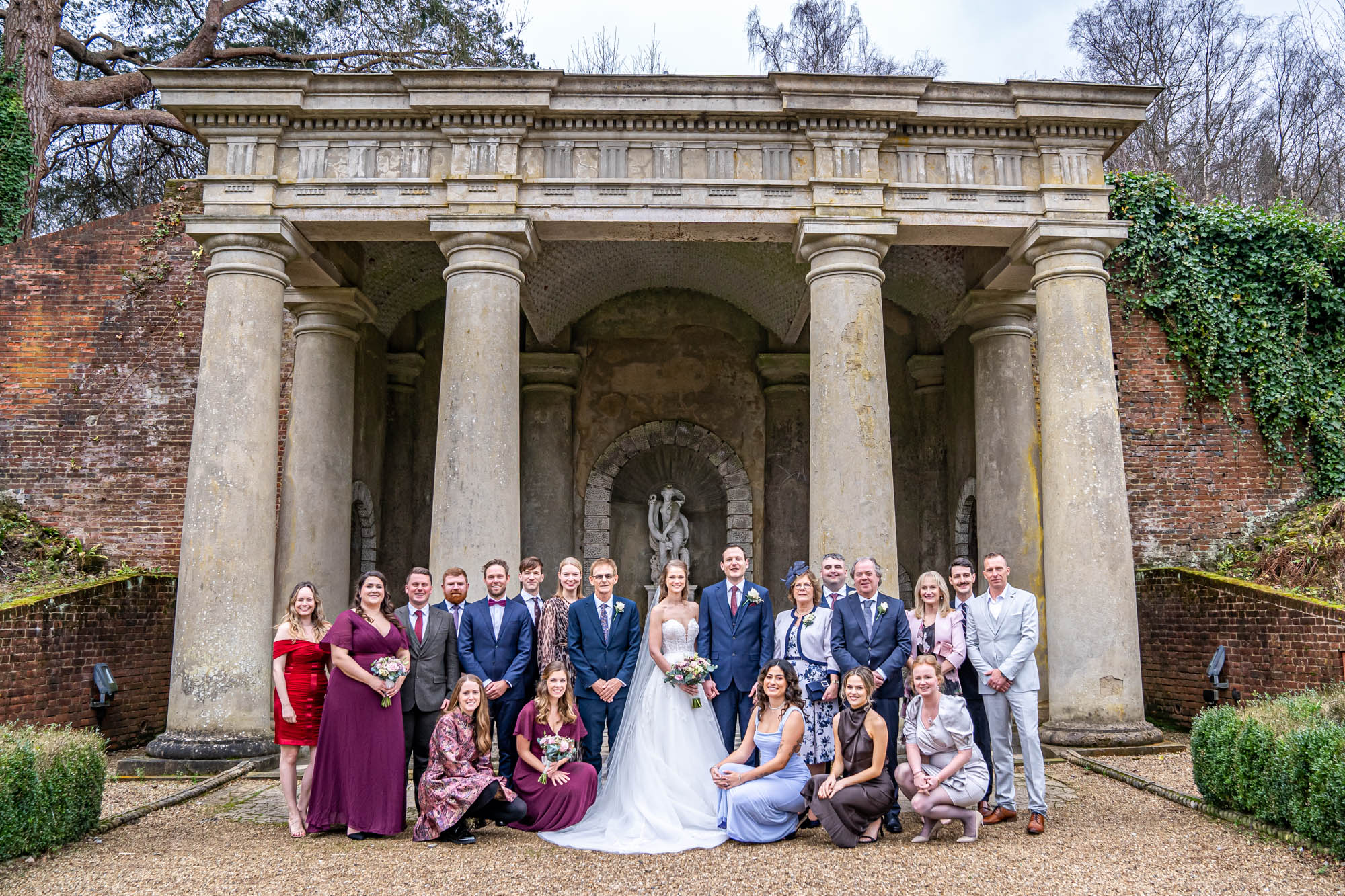 Wedding party in front of Italian temple.