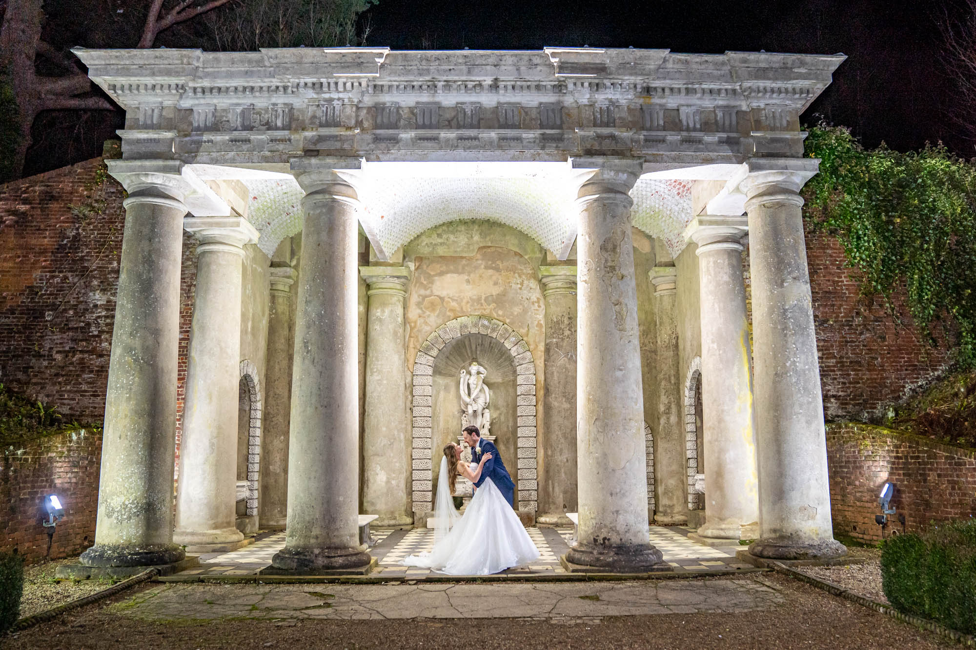 Newlyweds dance under the Italian temple.